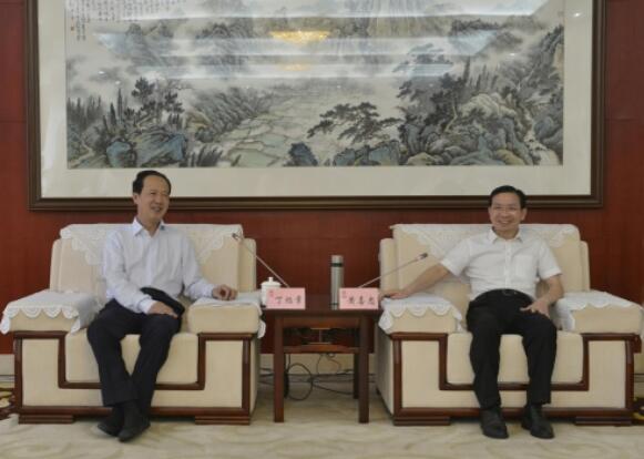 丁焰章拜會南昌市委副書記、市長黃喜忠