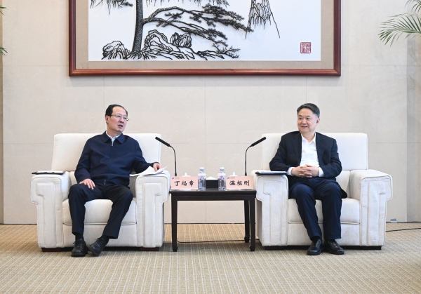 丁焰章與中國華能董事長、黨組書記溫樞剛會談